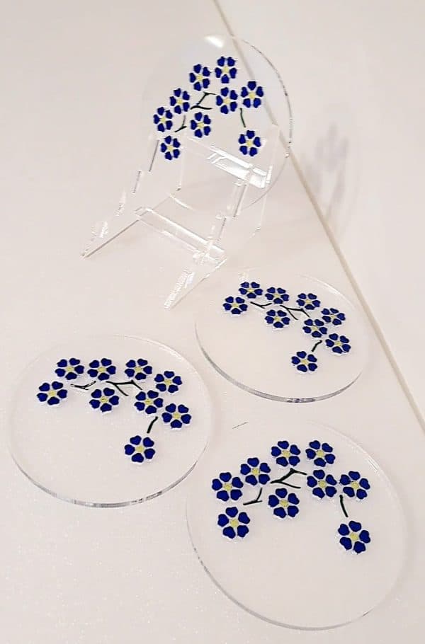 Bespoke designed Hand Crafted Forget Me Not Round Coasters with Dedicated Display Stand. 4 x 4mm Clear Acrylic.
