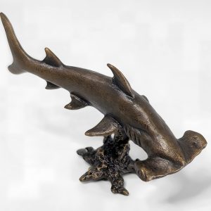 Solid bronze hammerhead shark sculpture mounted on a decorative base with multi-tonal patina finish by Marquise Jewellery