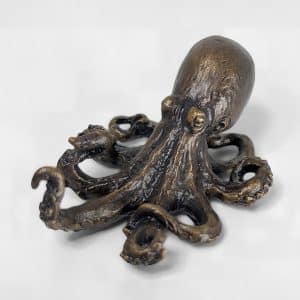 olid bronze octopus sculpture with intricate tentacle detailing and rich patina finish by Marquise Jewellery